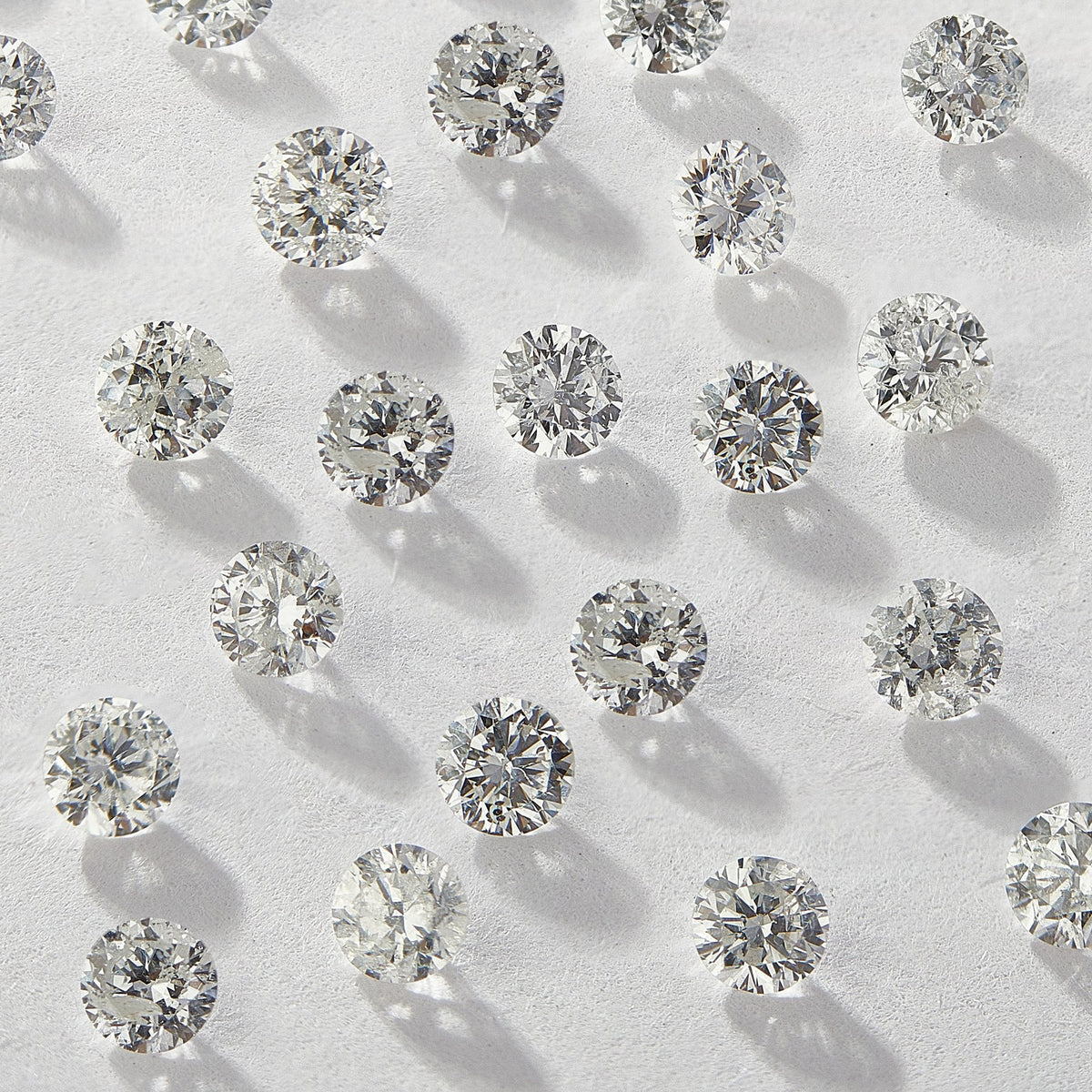 0.90 mm Round Natural White Melee Diamonds, DEF Color, I1-I2 Clarity