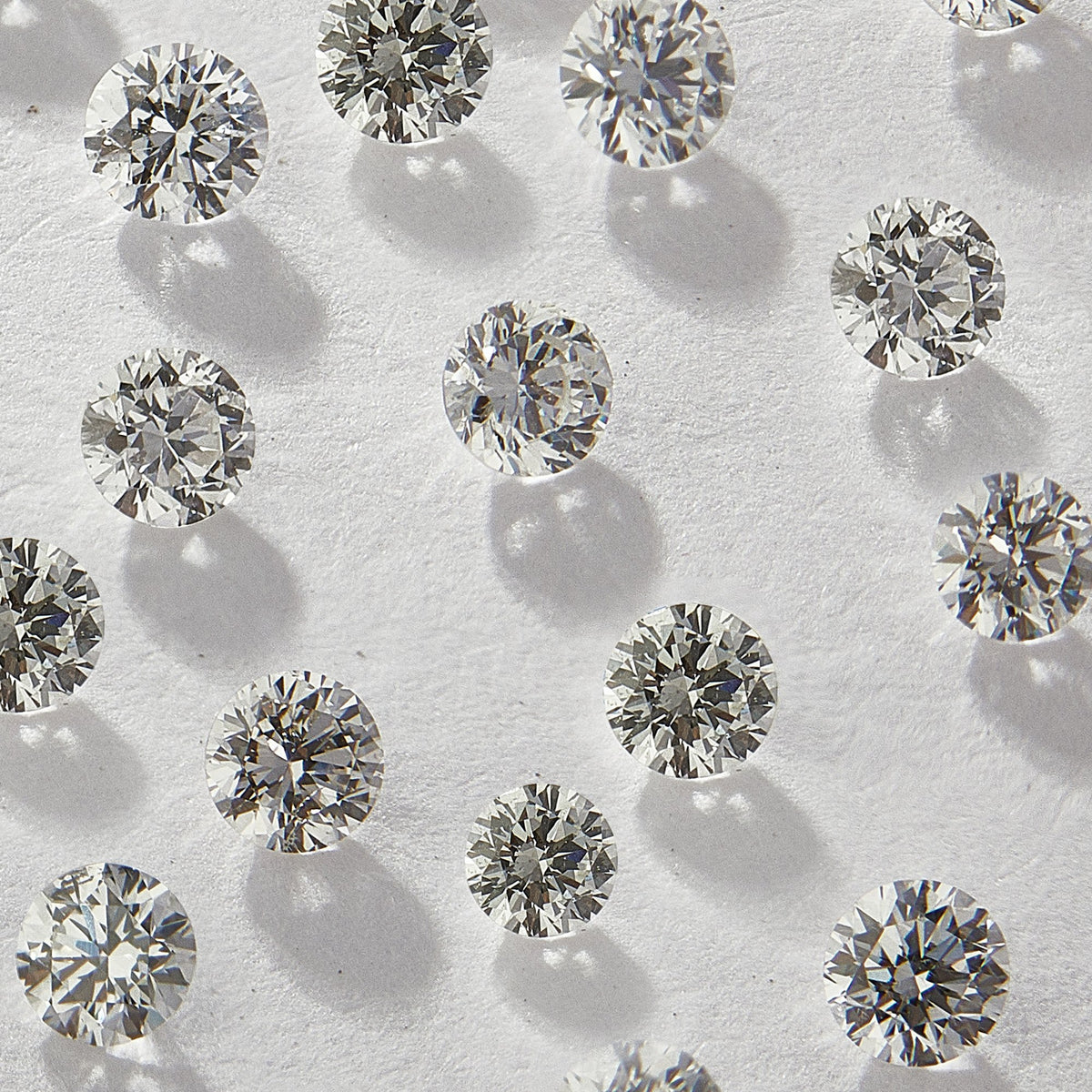 0.90 mm Round Natural White Melee Diamonds, GH Color, SI1-SI2 Clarity, Pack of 100