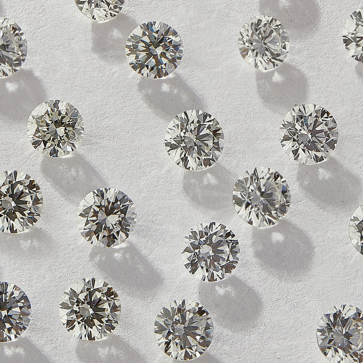 1.10 mm Round Natural White Melee Diamonds, GH Color, VVS-VS1 Clarity, Pack of 100