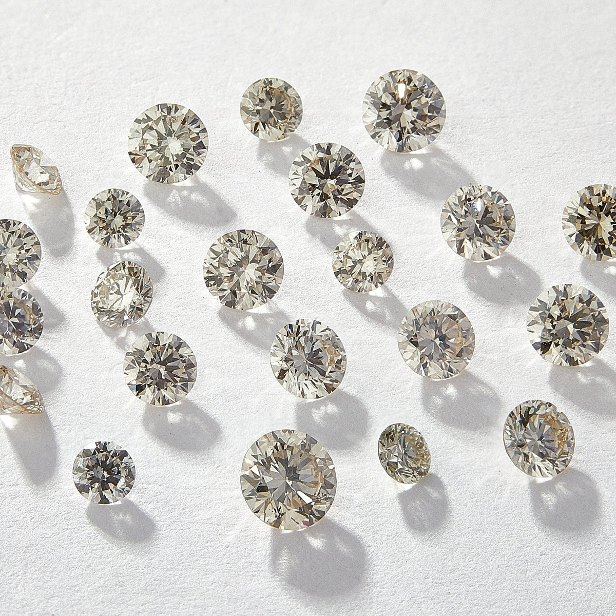 1.10 mm Round Natural White Melee Diamonds, IJKL Color, I1-I2 Clarity, Pack of 50
