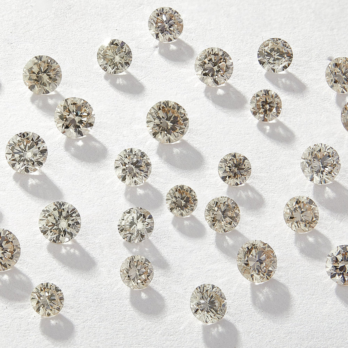 1.10 mm Round Natural White Melee Diamonds, IJKL Color, SI2-SI3 Clarity, Pack of 100