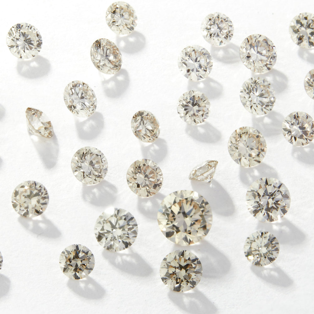 1.20 mm Round Natural White Melee Diamonds, IJKL Color, VVS-VS1 Clarity, Pack of 25